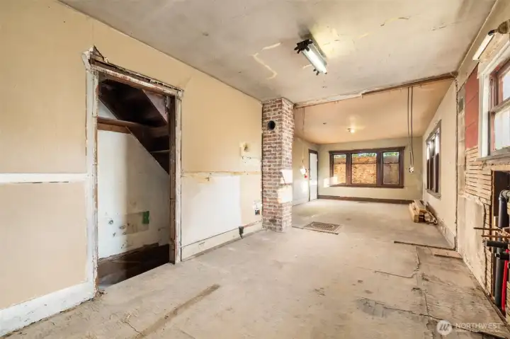 Open kitchen/living space provides easy access to the basement.