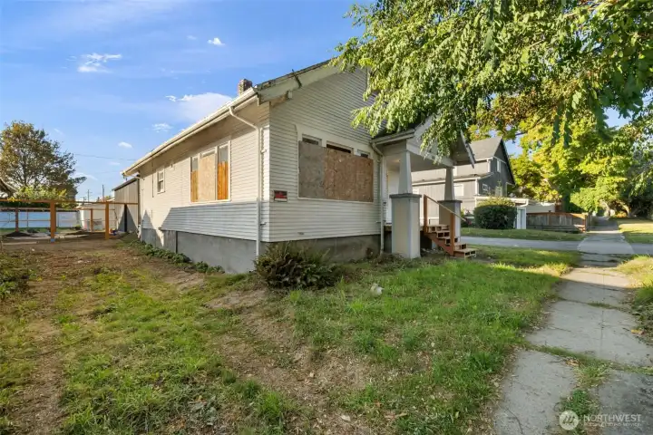 Area alongside the home offers potential for off-street parking.