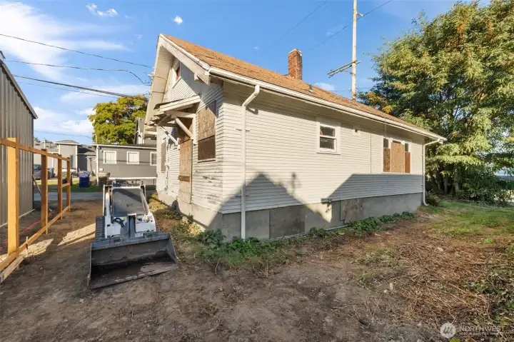Back door access via alley for added convenience.