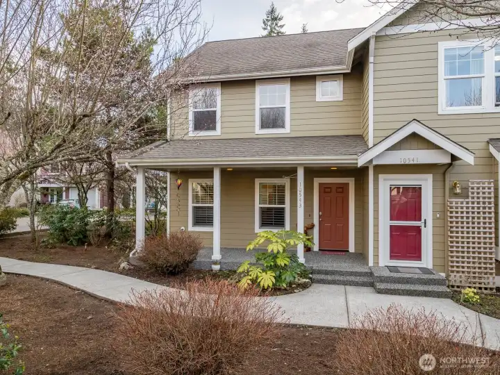 Craftsman style townhouse with covered front porch