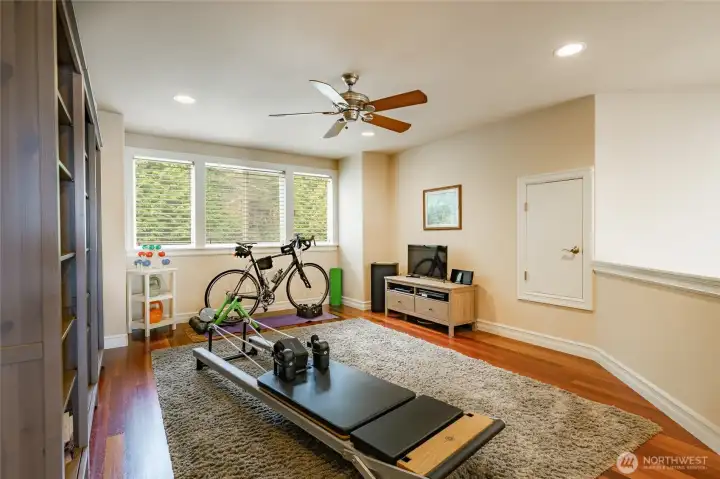 Upstairs loft with attic storage through the little man door.