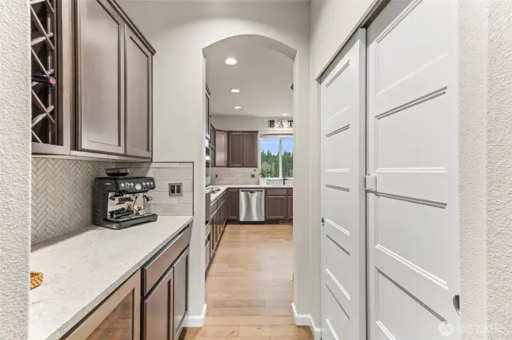 Wine bar and pantry with beverage refrigerator