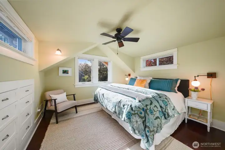 Primary bedroom with built-in storage and walk in closet (not shown)