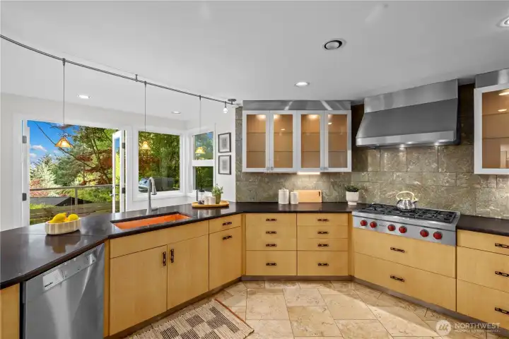 Updated kitchen with Wolf gas cooktop and exceptional views