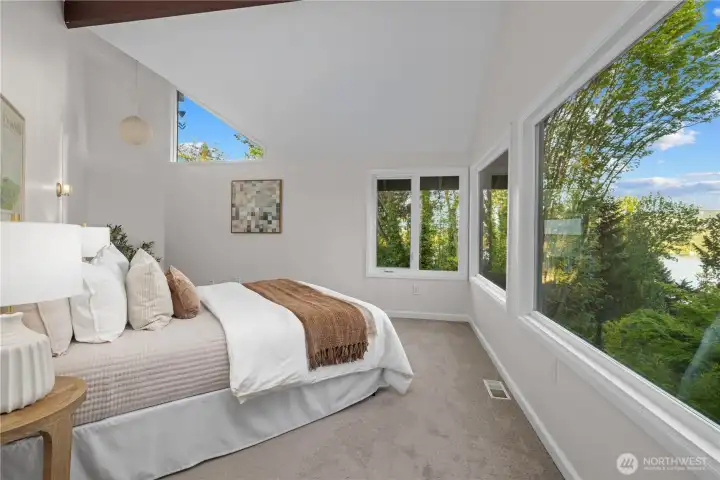 Primary Suite with lake and mountain views