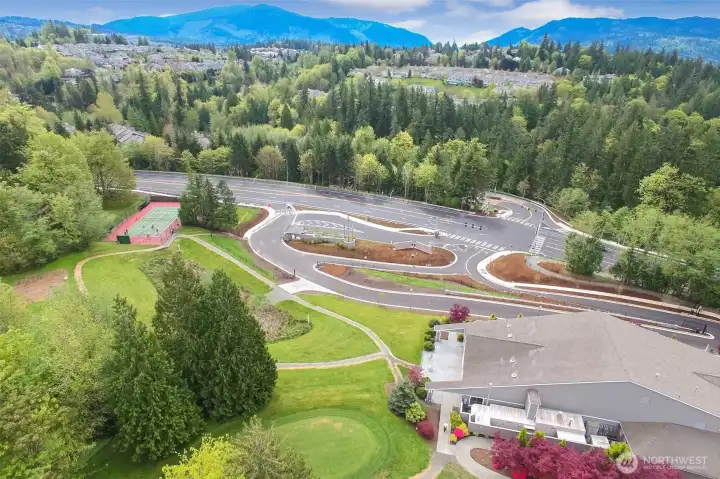 Clubhouse, entrance, and Sport Court/Pickleball Court.