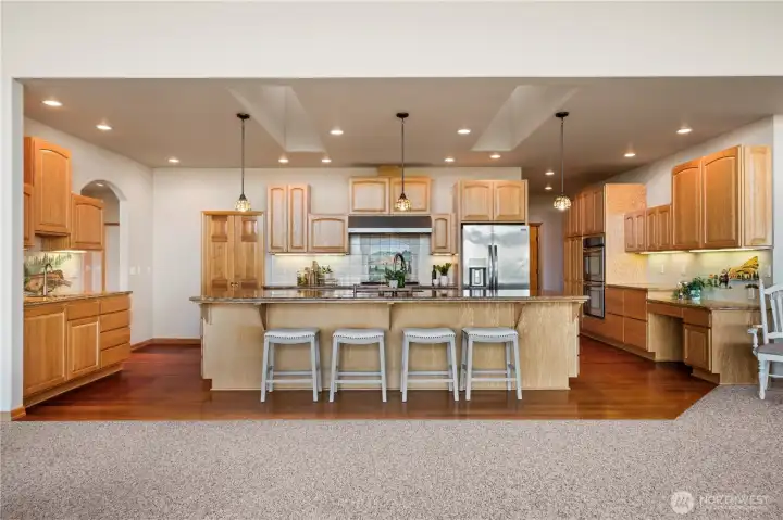 Thoughtfully designed, this huge kitchen features pull-outs in nearly every drwer or cabinet, and a walk in pantry for added storage. Thoughtfully designed, this huge kitchen features pull-outs in nearly every drwer or cabinet, and a walk in pantry for added storage.