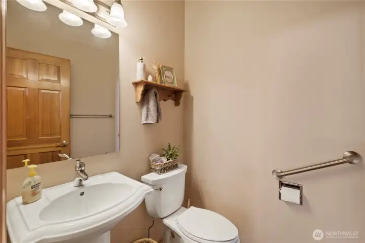 Main level powder bathroom. Main level powder bathroom.