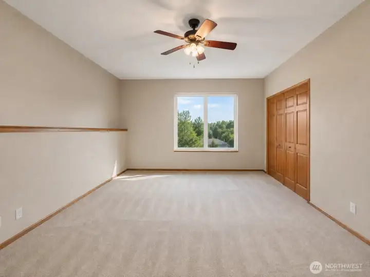 This bonus bedroom sits just off the large open space. *This is virtually painted to match the rest of the home. Current color is yellow. This bonus bedroom sits just off the large open space. *This is virtually painted to match the rest of the home. Current color is yellow.