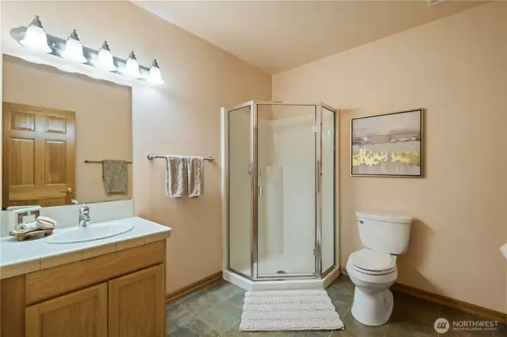 Downstairs also features its own 3/4 bath. Downstairs also features its own 3/4 bath.