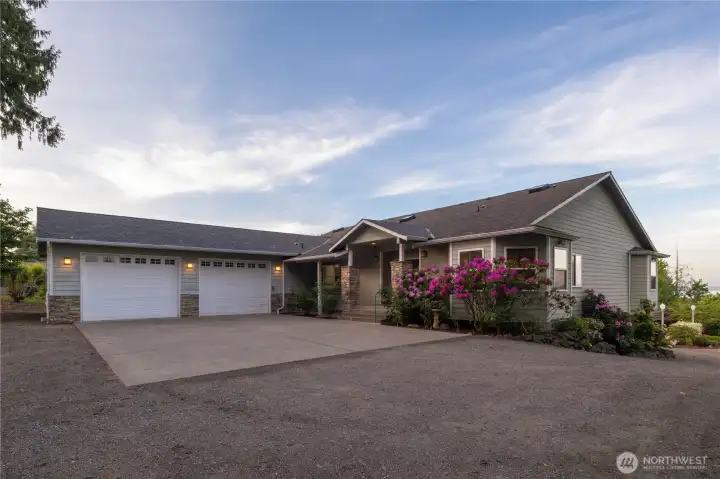 Large driveway with extra parking in addition to RV parking and hook up at the lower level. Large driveway with extra parking in addition to RV parking and hook up at the lower level.