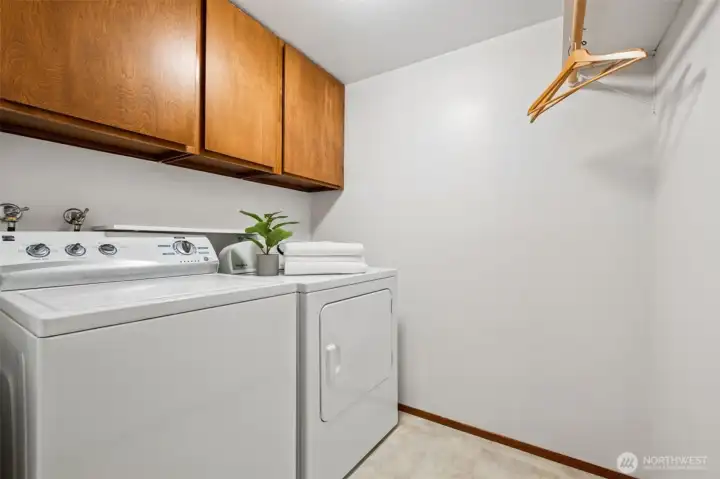 So practical thanks to the hanging clothes area and upper cabinets!