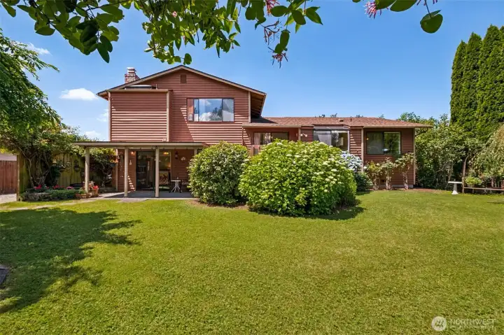 Large, level, fully fenced - and GORGEOUS! You will love your private backyard retreat!