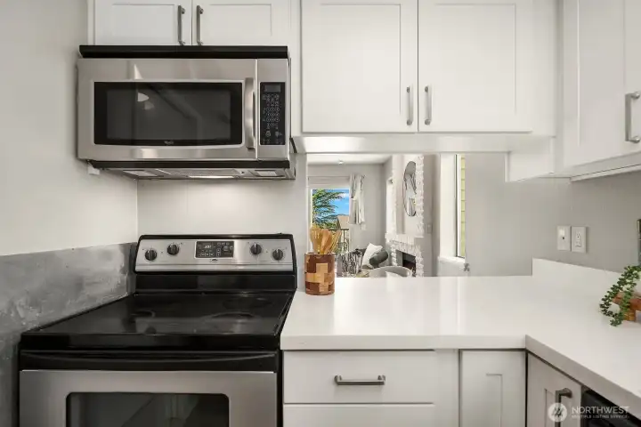 The kitchen pass through to the dining and living areas makes entertaining easy.