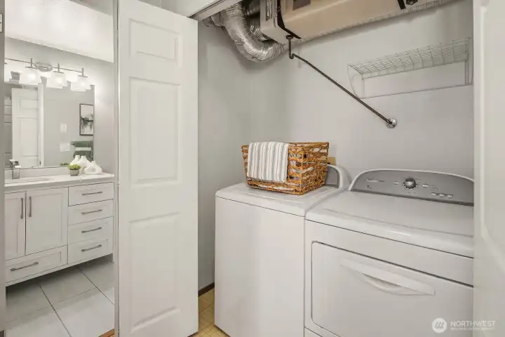 In unit laundry with full-size washer and dryer, convenient to the bedroom and bathroom.