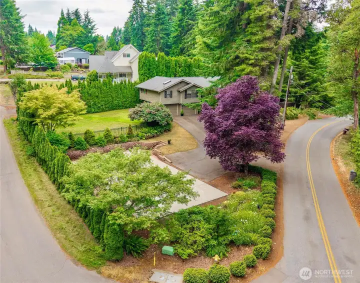 .42 acre lot with pickle ball sports court.