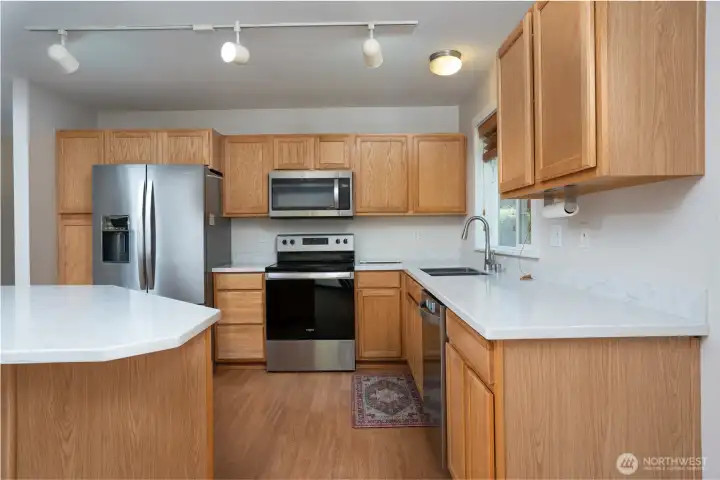 Updates include solid surface countertops