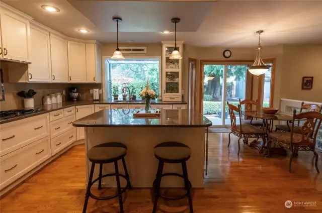 Seating at the kitchen island as well as an eating nook!