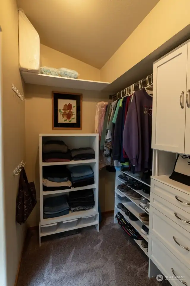 Walk in closet with vaulted ceilings!