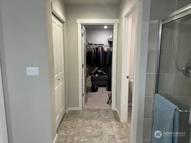 Master bathroom looking into walk in closet
