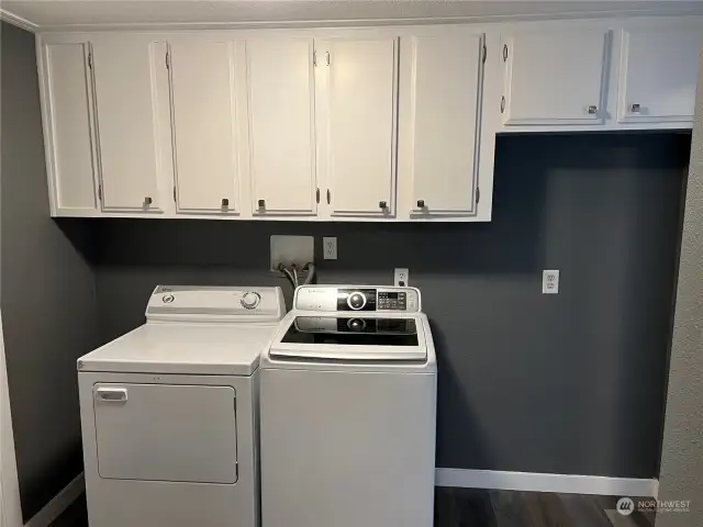 Utility room with plenty of room for freezer/refrigerator.