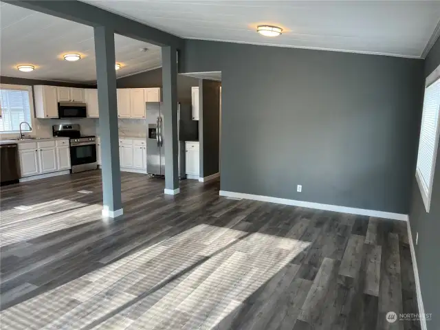 Another view of the living/dining area looking at kitchen.