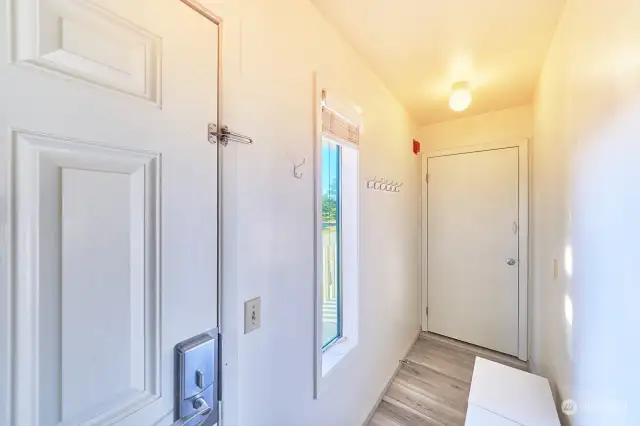 Entry with door to adjacent studio unit for guest flexibility (different owner)