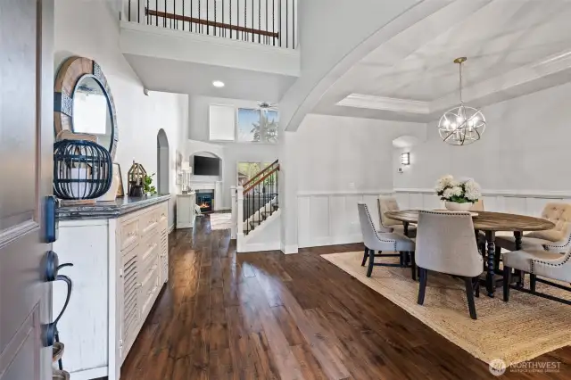 Step inside to a two-story entry with an arched doorway and plenty of natural light.