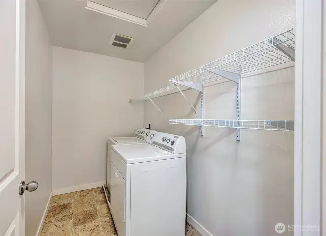 Washer and dryer are included in the walk in laundry room.