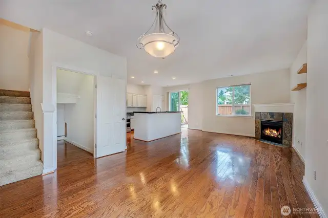 Inviting entry, hardwoods, updated kitchen, lots of storage under the stairs and a half bath with a pedestal sink. Enter from the front door or garage.