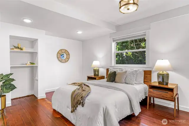 Built in storage and lots of space for a dresser, desk, or reading chair.