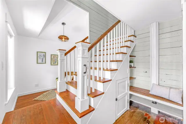 Built in bench, reclaimed newel posts from Seattle, so many thoughtful details honoring the history of the home and the craftsmanship of the era.