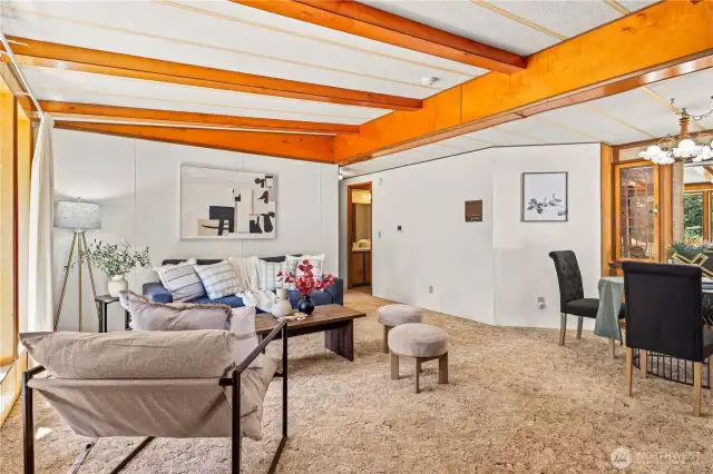 Standing in the entryway, formal living room and dining.