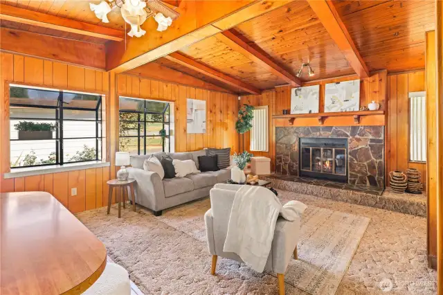 Cozy living room vibes with vaulted ceilings.