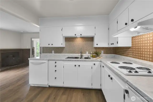 New countertops, new stainless sink, and cooktop