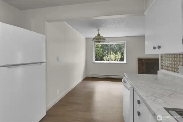 New refrigerator in eat-in kitchen