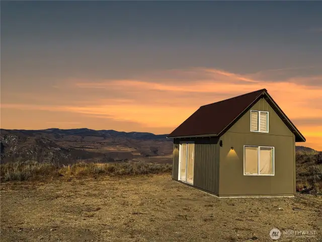 Golden Hour Glory! Unwind each evening with breathtaking sunsets over the rolling hills of Mansfield. This cabin even has it's own drilled well!