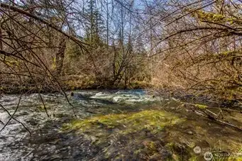You'll hear the sounds of Big Creek from the Party deck. A 3 min walk from property.