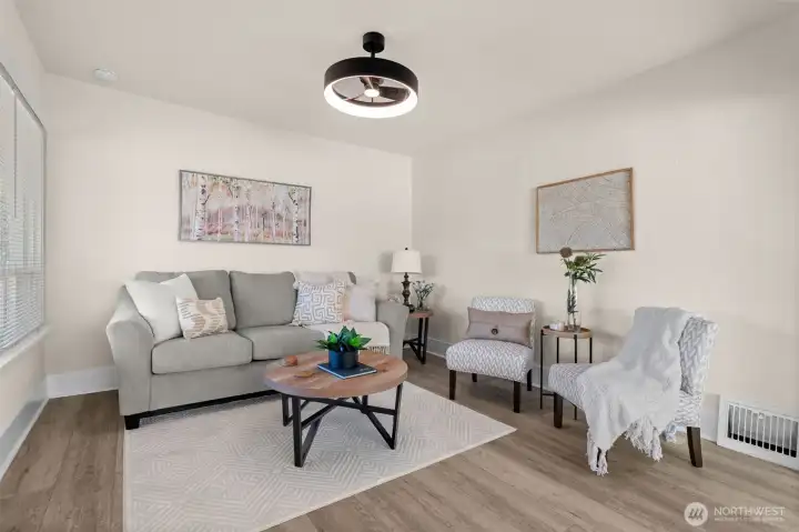 Living room with huge picture window, new flooring, new lighting