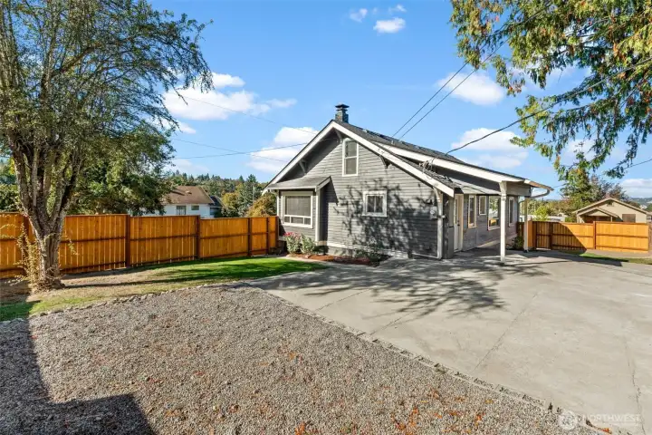 HUGE, fully fenced yard with room for a large shop