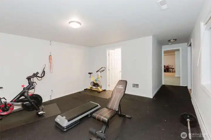 Room currently used as gym with bathroom off room