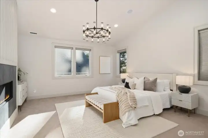 Vaulted ceilings in the Primary suite complete with romantic chandelier