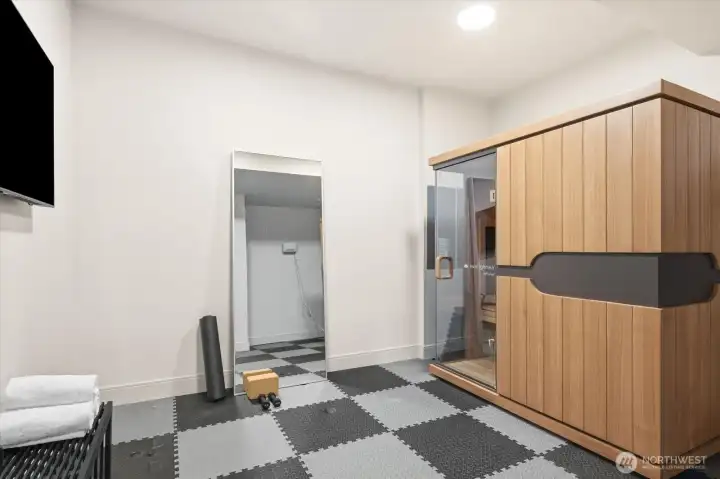 Red light therapy booth! Stays with home in this Wellness/Workout room area.