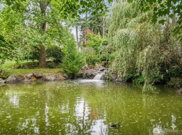 private pond and waterfall right off the back deck