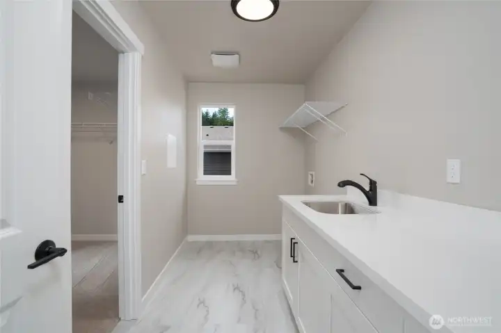 Photos are of another home in the community and are for illustration purposes only to reflect typical finishes.  May depict seller enhancements.  Colors and options may vary.