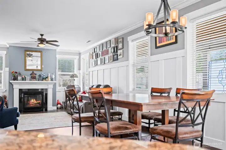 view looking from the kitchen island to the eating space and family room
