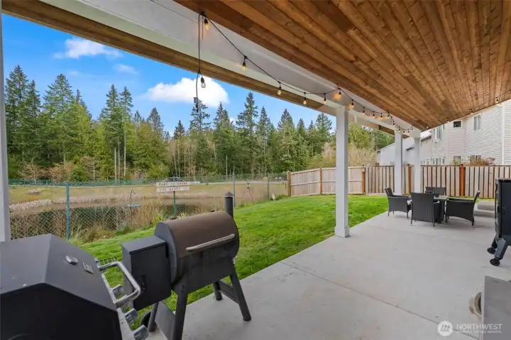 Covered front porch with plenty of room for entertaining