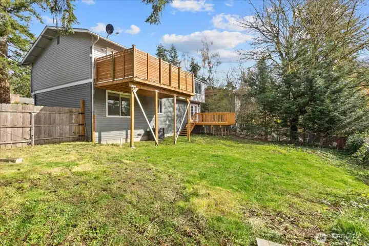 Backyard complete with storage shed.