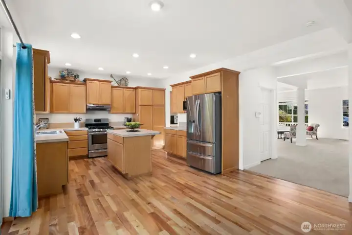 Kitchen with view into dining / living room.