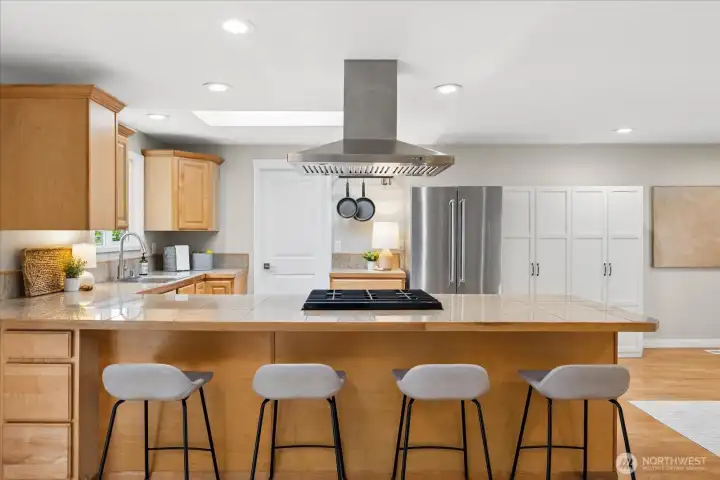 Enjoy cooking for guests without feeling secluded in a separate space.  Let the parties commence.